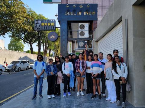 Another group photo of lab members outside the Soul of India restaurant.